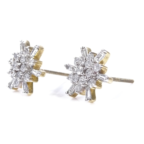 394 - A pair of 9ct gold diamond cluster snowflake earrings, set with round and baguette-cut diamonds, scr... 