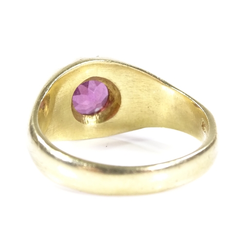 395 - A large 18ct gold pink stone signet ring, setting height 11.3mm, size V, 11.7g