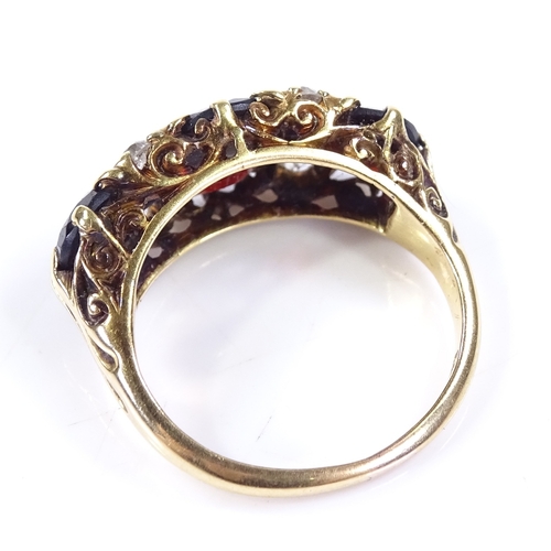 397 - A large 18ct gold garnet and diamond half-hoop ring, with pierced scrollwork bridge, setting height ... 