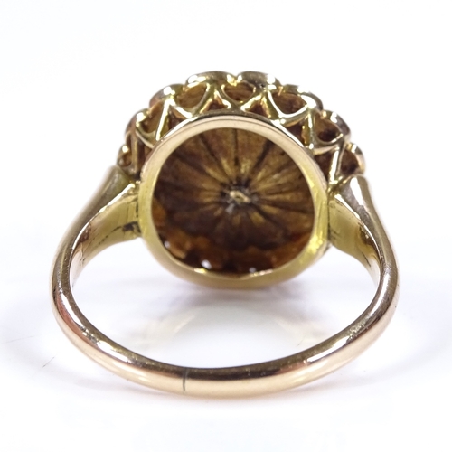 398 - An unmarked gold coral and split-pearl cluster ring, with pierced bridge and closed back setting, se... 