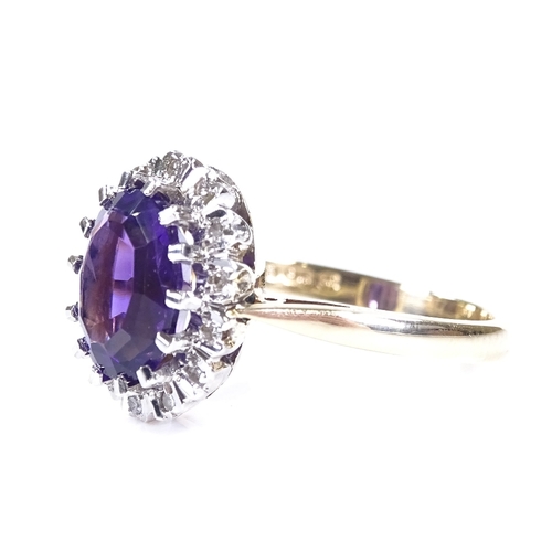 401 - A 9ct gold oval-cut amethyst and diamond cluster ring, setting height 13mm, size L, 3.3g