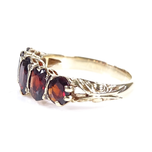 402 - A 9ct gold 5-stone garnet half-hoop ring, with engraved shoulders and pierced bridge, setting height... 