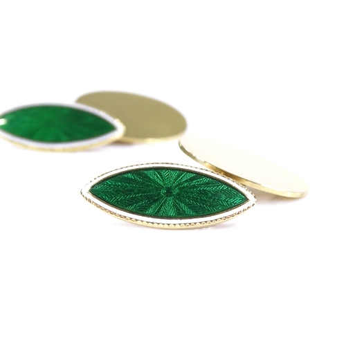 404 - A pair of 18ct gold green and white enamel cufflinks, by Owen Powell, hallmarks Birmingham 1930, mar... 