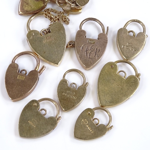 407 - 12 9ct gold heart locks for charm bracelets, largest length 26mm, 22.6g total