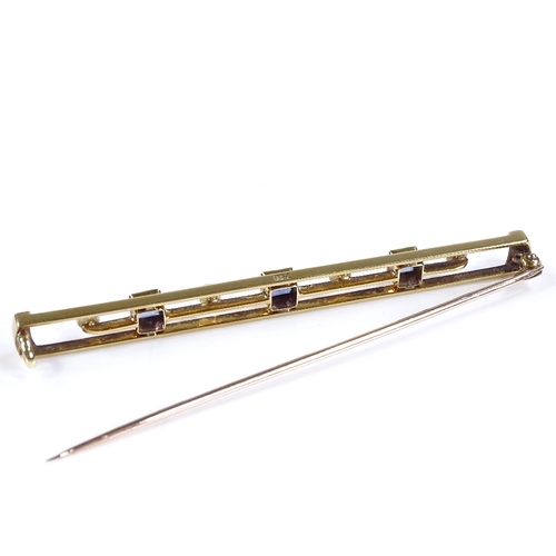 409 - An Edwardian 15ct gold sapphire and pearl bar brooch, openwork settings with 3 square-cut sapphires,... 