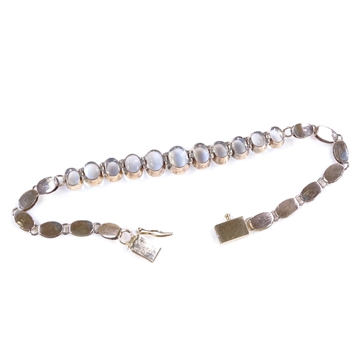 425 - A 14ct gold graduate cabochon moonstone bracelet, largest length 7.8mm, bracelet length 17cm, 4.3g