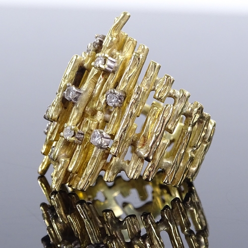 426 - A 1970s large unmarked gold and diamond naturalistic cocktail ring, pierced all over, unmarked setti... 