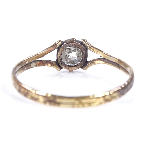 429 - A Georgian unmarked gold solitaire diamond ring, with floral engraved shoulders and shank, diamond a... 