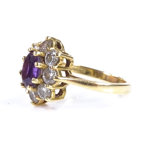 430 - An 18ct gold amethyst and diamond cluster ring, total diamond content approx 0.8ct, setting height 1... 