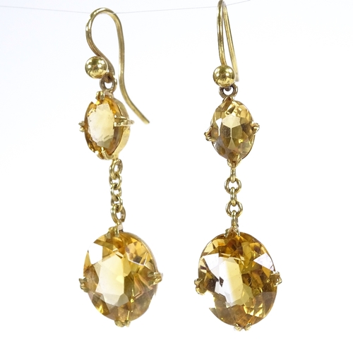 433 - A pair of unmarked gold 2-stone citrine drop earrings, with shepherd hook fittings, height excluding... 