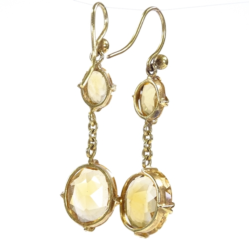 433 - A pair of unmarked gold 2-stone citrine drop earrings, with shepherd hook fittings, height excluding... 