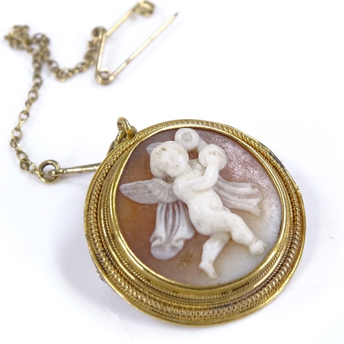 438 - An unmarked gold relief carved cameo brooch, depicting cherub, brooch diameter 24.1mm, 5.1g