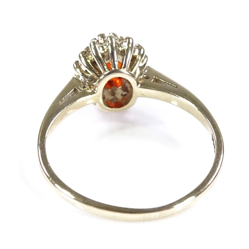 447 - A 9ct gold fire opal and diamond cluster ring, setting height 9.9mm, size L, 2.1g