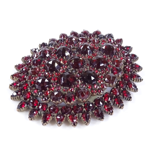 452 - A large Victorian faceted garnet pendant, unmarked garnet gold settings, pendant length 54.4mm, 17g