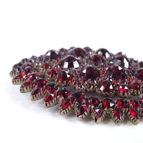 452 - A large Victorian faceted garnet pendant, unmarked garnet gold settings, pendant length 54.4mm, 17g