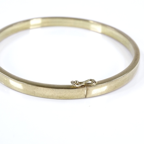 458 - A German 8ct gold bangle, band width 4.7mm, internal diameter 66mm, internal height 59mm, 8.3g