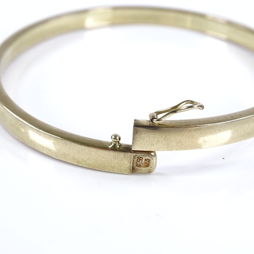 458 - A German 8ct gold bangle, band width 4.7mm, internal diameter 66mm, internal height 59mm, 8.3g