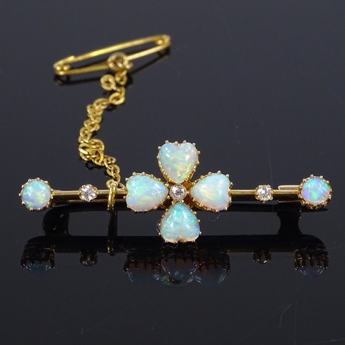 459 - An Edwardian 15ct gold opal and diamond four-leaf clover bar brooch, set with heart and round caboch... 