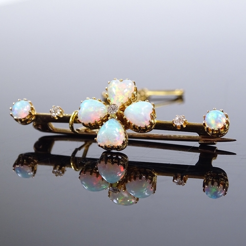 459 - An Edwardian 15ct gold opal and diamond four-leaf clover bar brooch, set with heart and round caboch... 