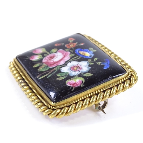 466 - A rectangular floral painted porcelain panel brooch, in unmarked yellow metal rope twist frame, broo... 