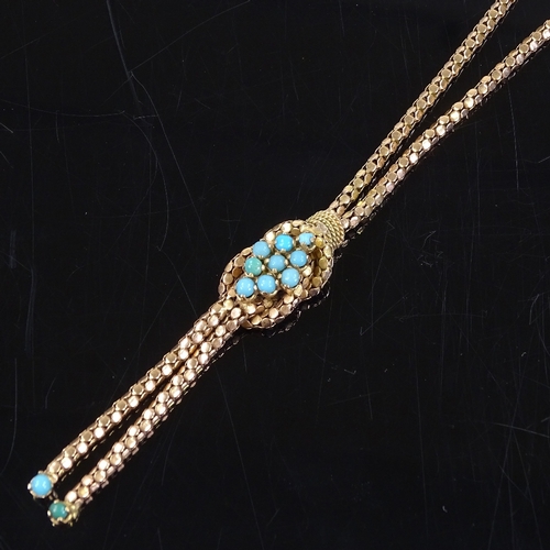 469 - An unmarked gold turquoise knot and double-tassel necklace, with popcorn link chain, necklace length... 