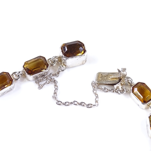 470 - A Continental silver citrine panel bracelet, bracelet length 20cm, 10g