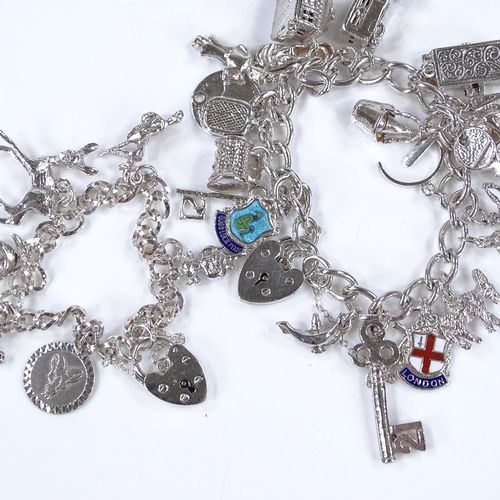 472 - 2 silver charm bracelets, 82.7g total (2)