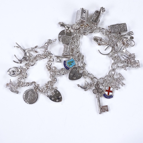 472 - 2 silver charm bracelets, 82.7g total (2)