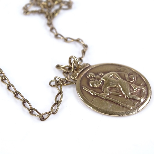 476 - A 9ct gold St Christopher pendant necklace, on 9ct chain, pendant diameter 20.1mm, necklace length 6... 