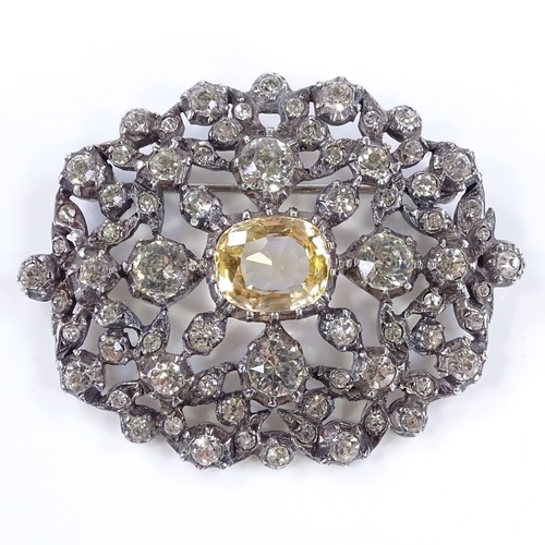 477 - A Georgian silver yellow stone and paste brooch, pierced closed back settings, brooch length 49.6mm,... 