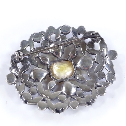 477 - A Georgian silver yellow stone and paste brooch, pierced closed back settings, brooch length 49.6mm,... 