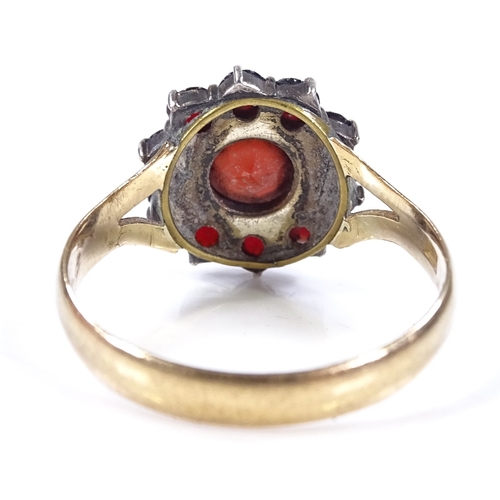 480 - An 18ct gold faceted garnet cluster ring, setting height 13.4mm, size S, 3.3g