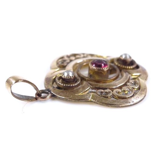 481 - An unmarked gold garnet and split-pearl pendant, openwork stylised settings, height excluding bale 2... 