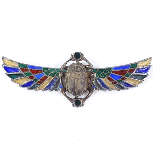 484 - A Continental silver Egyptian revival style winged scarab brooch, with plique a jour enamel panels, ... 