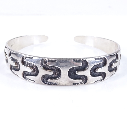 487 - A David Andersen Norwegian sterling silver Viking style bangle, internal diameter 68mm, internal hei... 