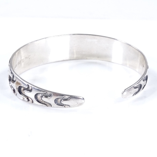 487 - A David Andersen Norwegian sterling silver Viking style bangle, internal diameter 68mm, internal hei... 