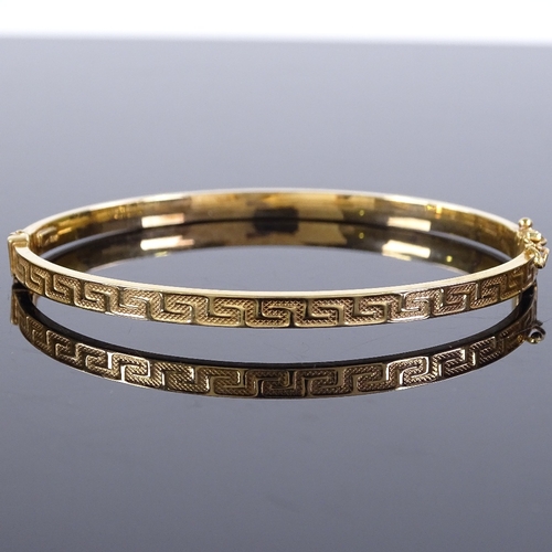 488 - A 9ct gold hinged bangle, with Greek key pattern, band width 3.9mm, internal diameter 60mm, internal... 