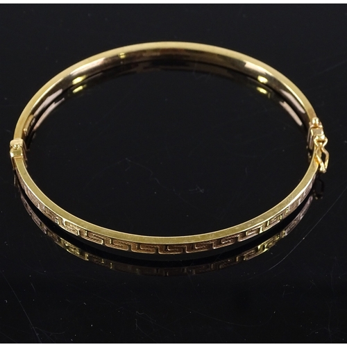 488 - A 9ct gold hinged bangle, with Greek key pattern, band width 3.9mm, internal diameter 60mm, internal... 