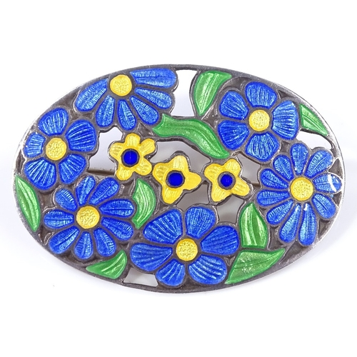 493 - An Arts and Crafts silver and coloured enamel oval brooch, with floral decoration, maker's marks D a... 