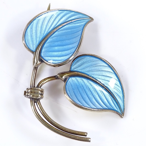 497 - A Norwegian sterling silver gilt and blue enamel leaf brooch, by Hans Myhre of Oslo, length 36.9mm, ... 