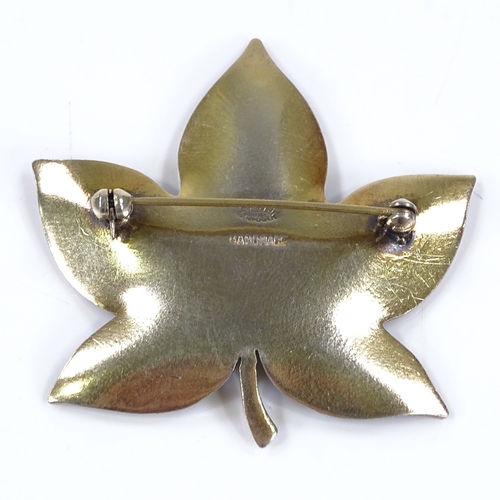 498 - A Danish sterling silver gilt and green enamel leaf brooch, by Brdr Bjerring of Copenhagen, length 4... 