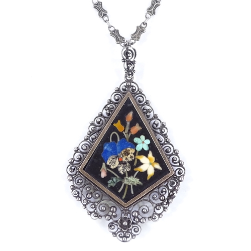 499 - An unmarked silver and gold pietra dura pendant necklace, on fancy link chain, pendant height exclud... 