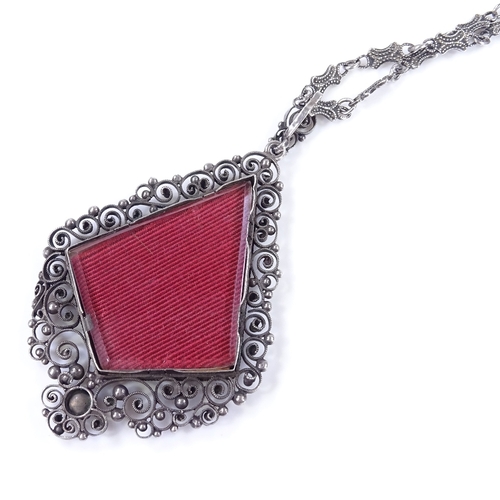 499 - An unmarked silver and gold pietra dura pendant necklace, on fancy link chain, pendant height exclud... 