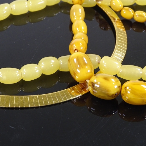 509 - A gold plated collar necklace, lemon quartz bead necklace, and a graduated plastic bead necklace (3)