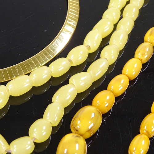 509 - A gold plated collar necklace, lemon quartz bead necklace, and a graduated plastic bead necklace (3)