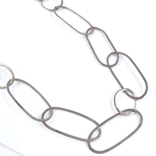 520 - A sterling silver interlinked oval stylised necklace, stamped Bastian, length 54cm, 60.8g