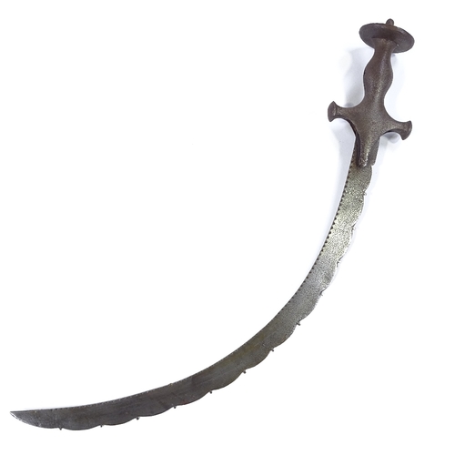 21 - A Middle Eastern curved sword, probably 18th century, with notched blade and steel hilt, length 54cm