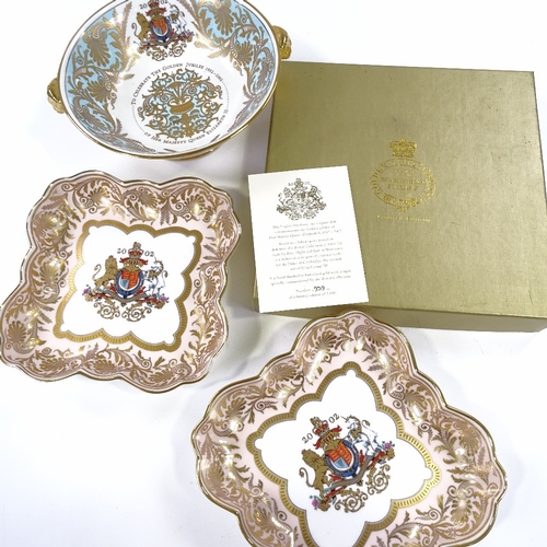 55 - A pair of 2002 Buckingham Palace Golden Jubilee limited edition china bowls, width 22cm, and a simil... 