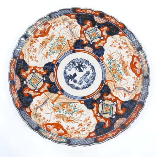 66 - A large Chinese porcelain Imari pattern charger, hand painted and gilded decoration, diameter 46cm, ... 