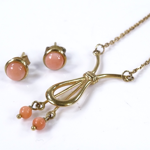 812 - A 9ct gold carved coral bead necklace, necklace length 14cm, together with a pair of matching earrin... 